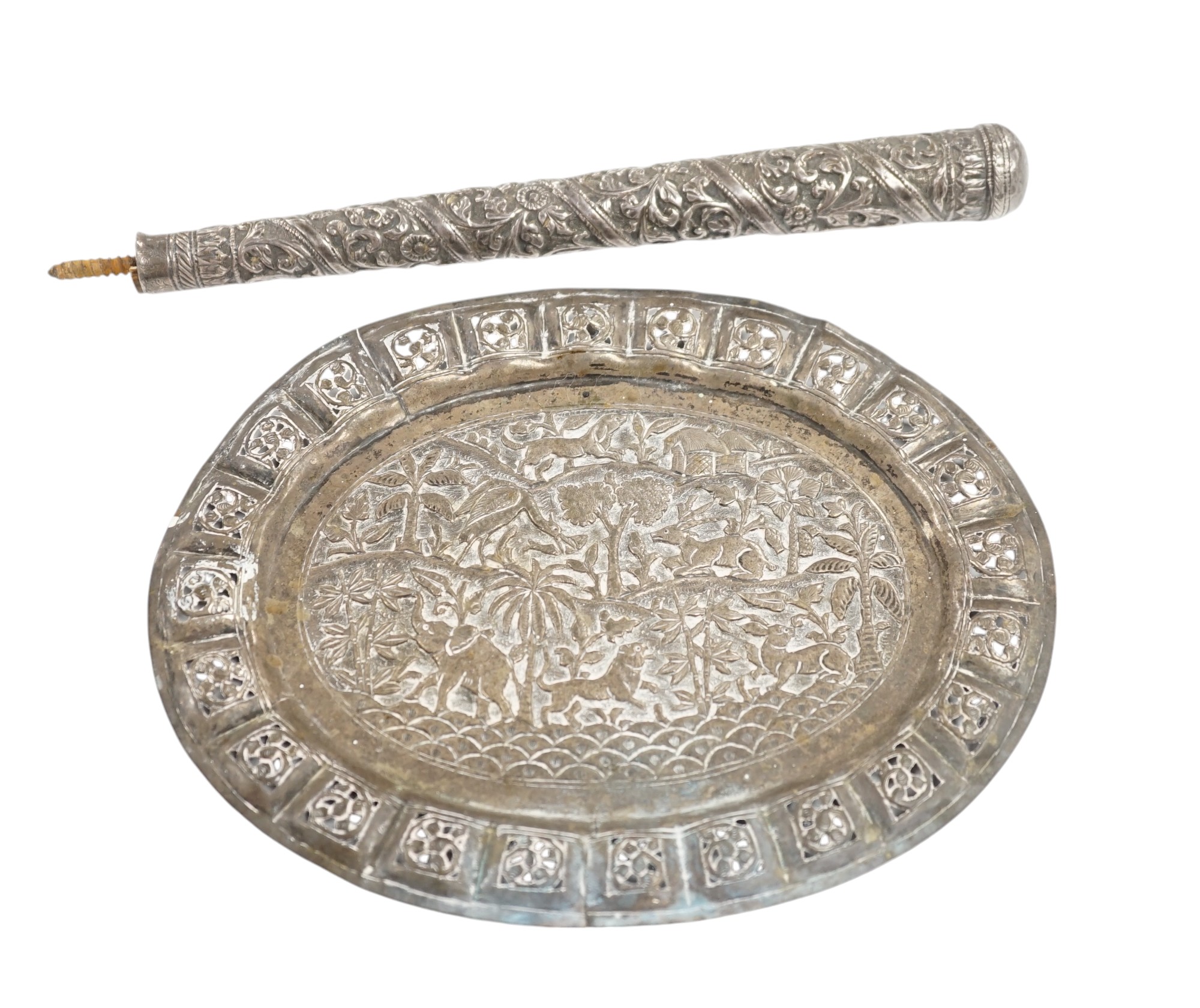 An Indian pierced white metal oval plaque and a white metal cane handle. Condition - poor to fair